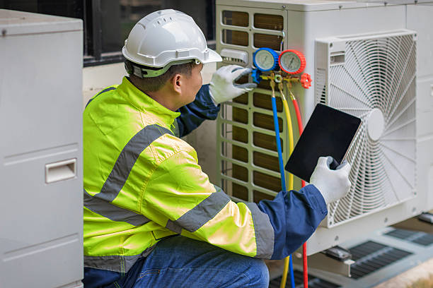 Professional Air Conditioning Repair technician working in Oakland City, IN